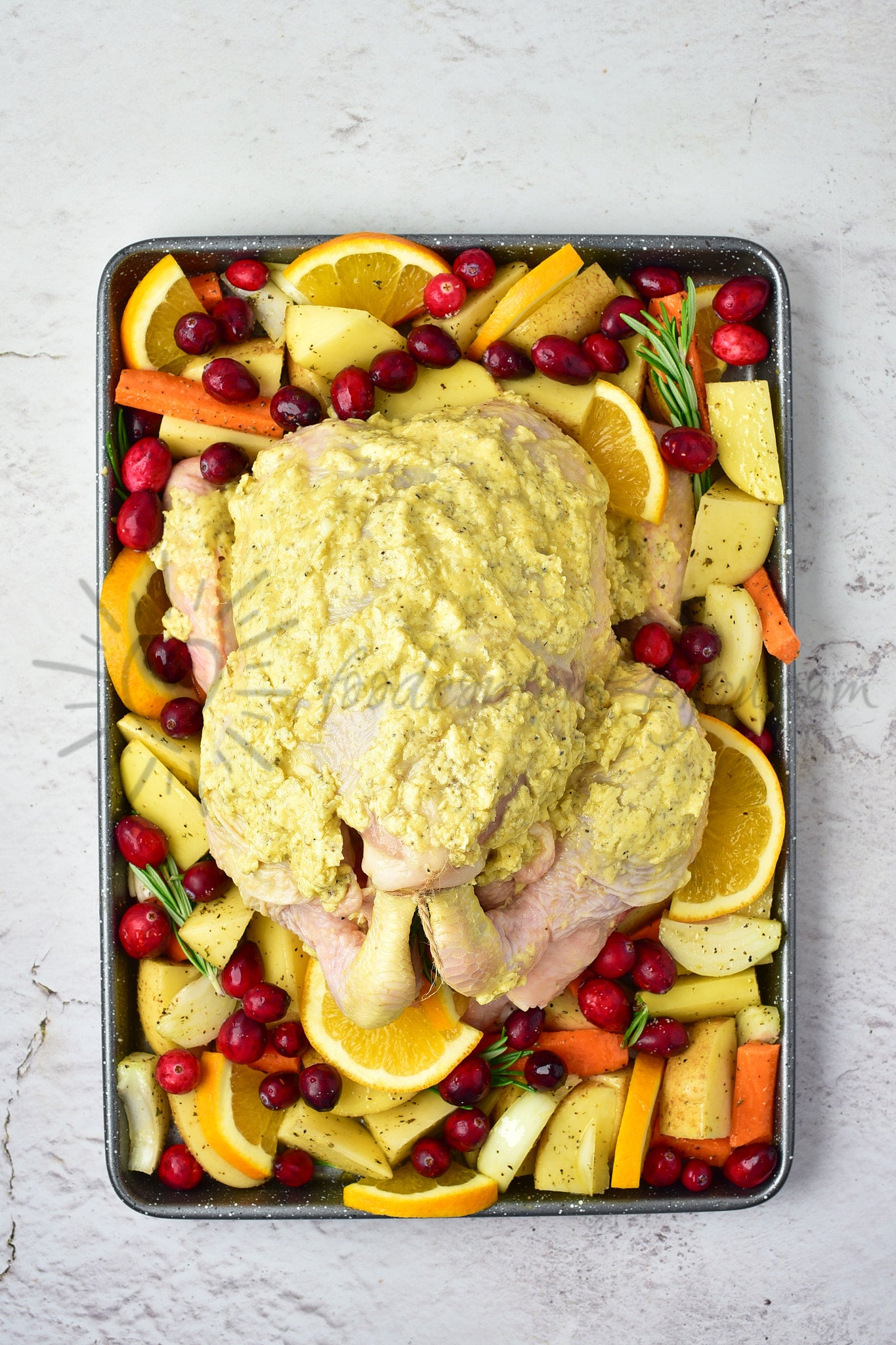 Christmas Roasted Chicken with orange and cranberries
