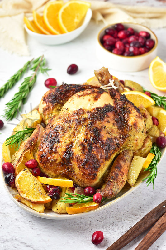 Christmas Roasted Chicken with orange and cranberries