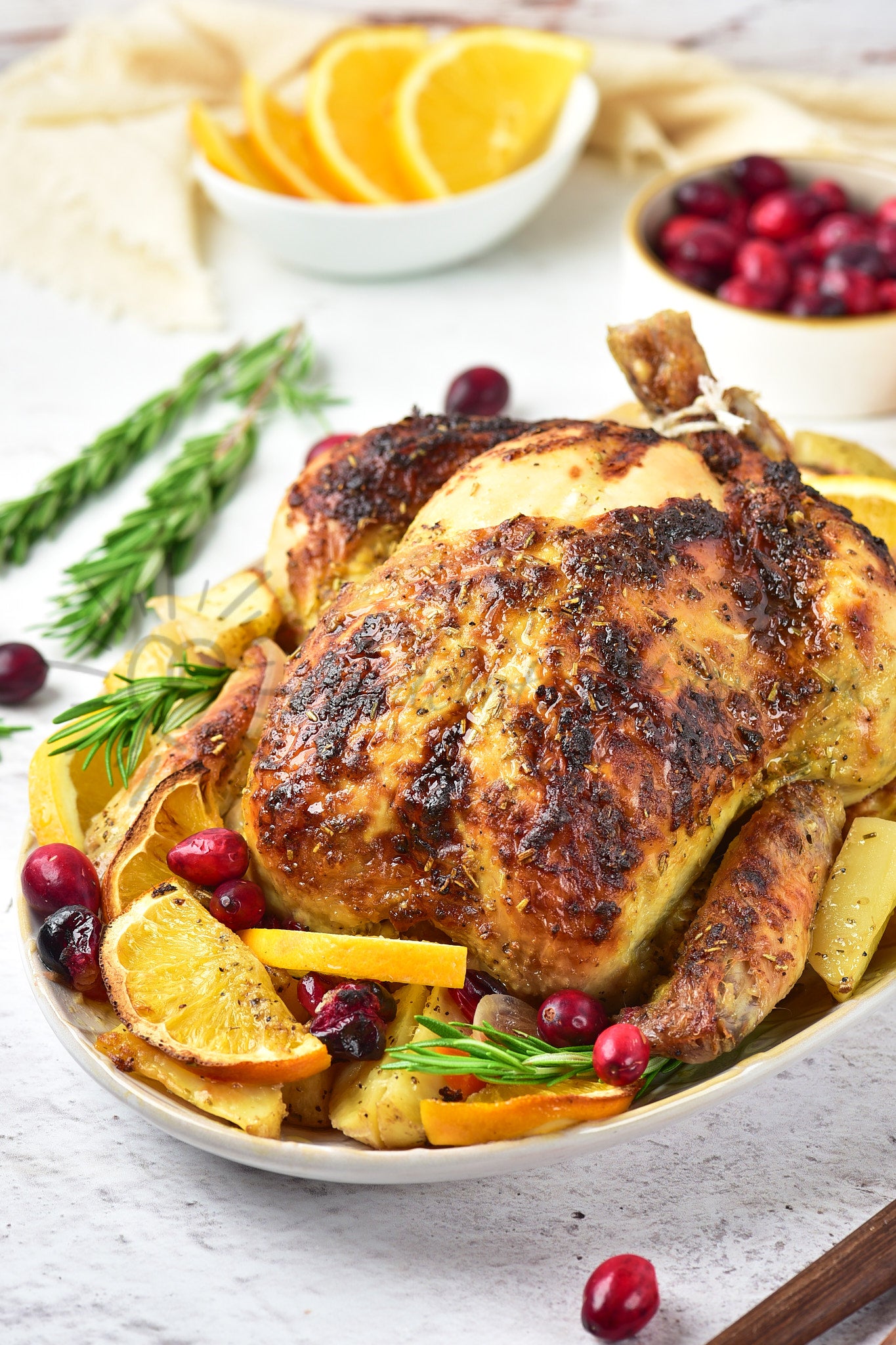Christmas Roasted Chicken with orange and cranberries