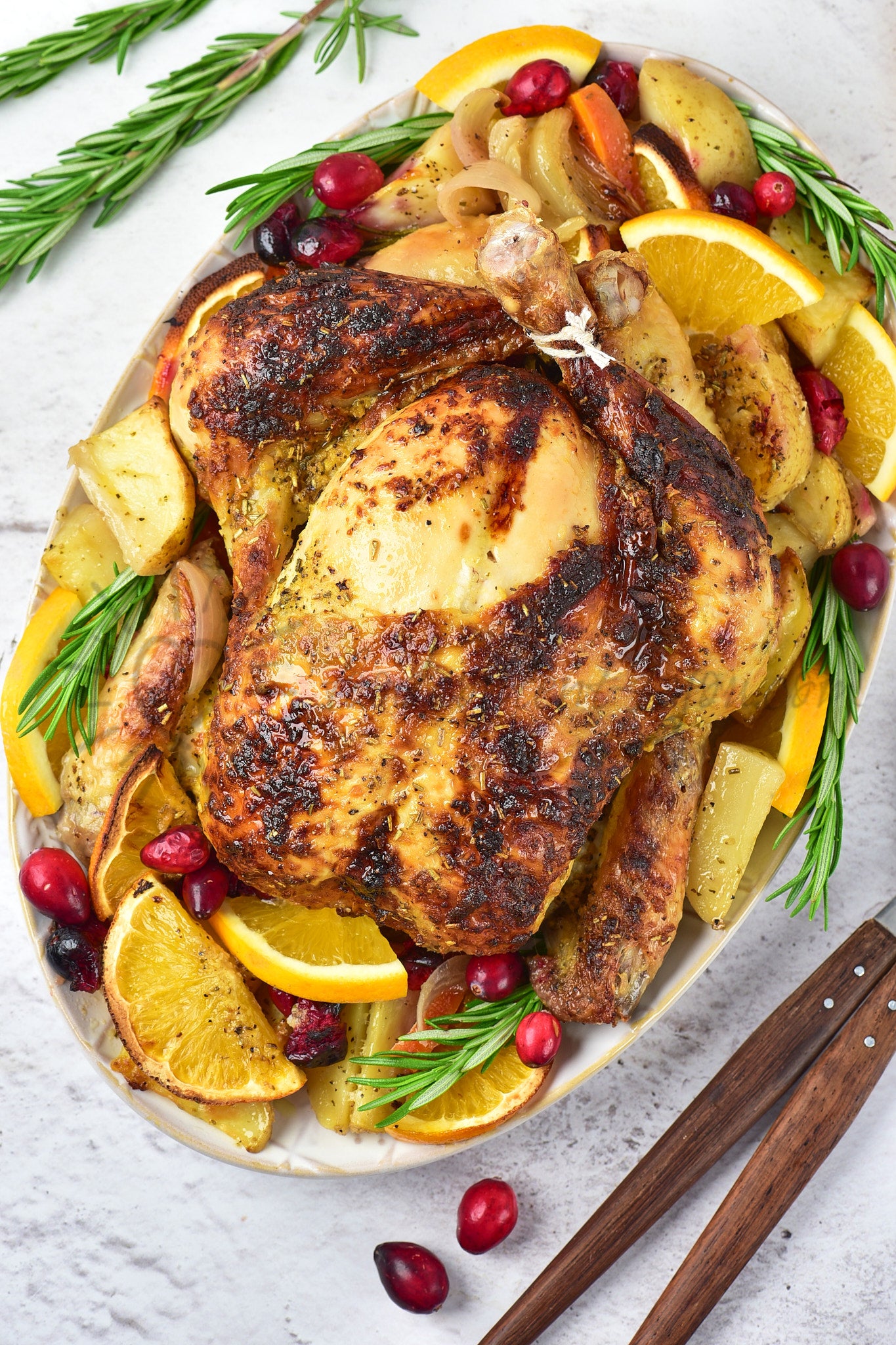 Christmas Roasted Chicken with orange and cranberries