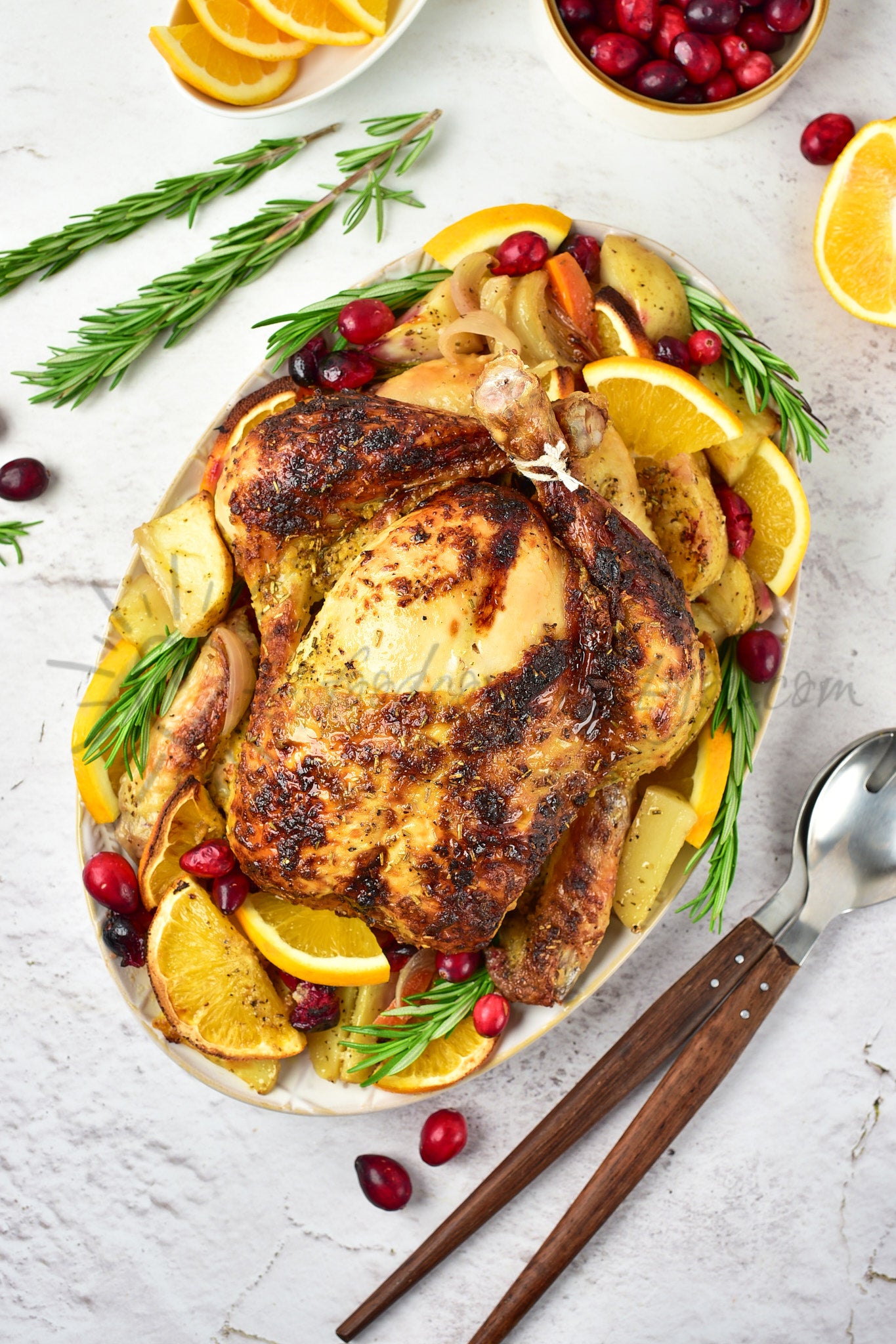 Christmas Roasted Chicken with orange and cranberries