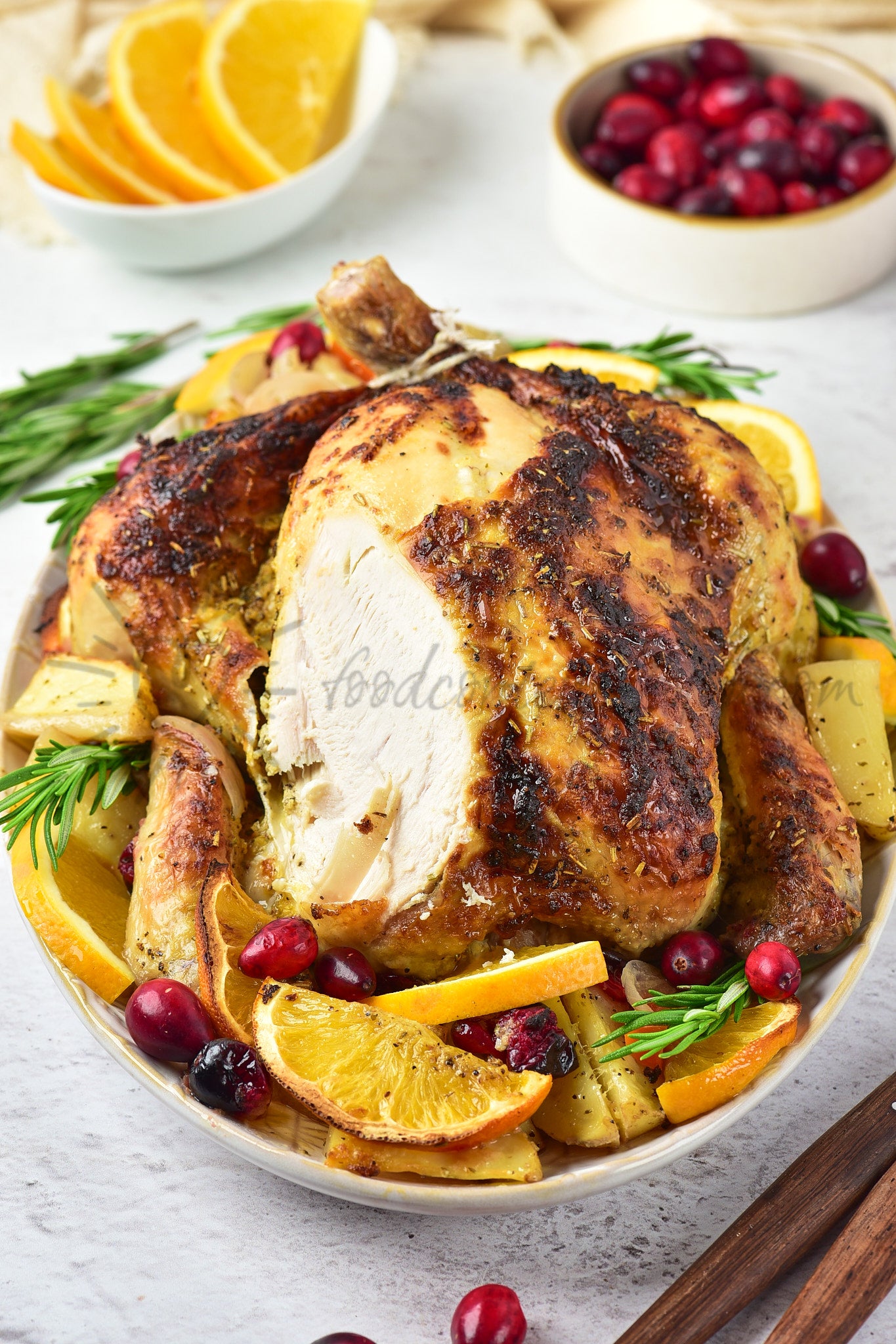 Christmas Roasted Chicken with orange and cranberries
