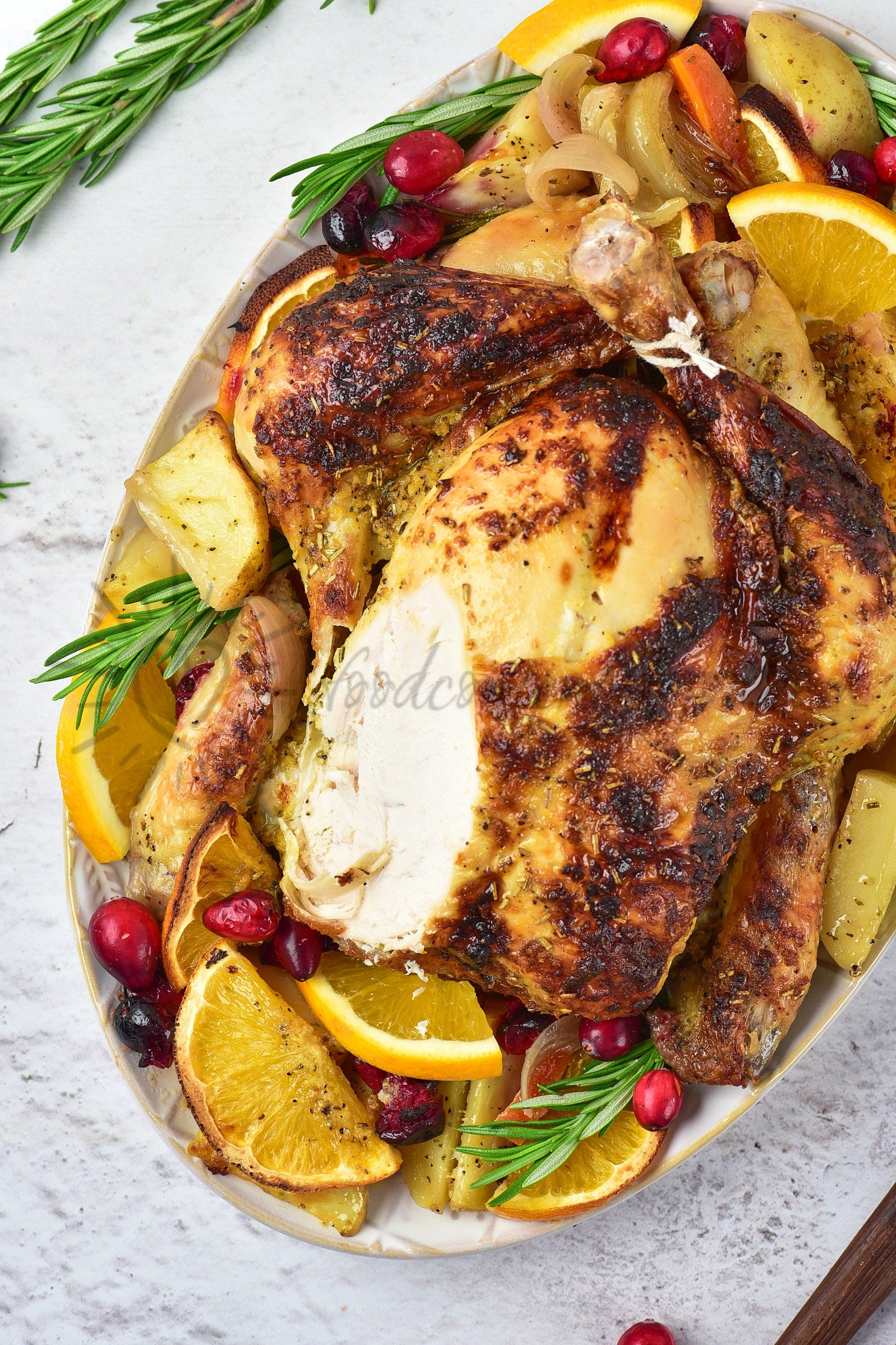 Christmas Roasted Chicken with orange and cranberries
