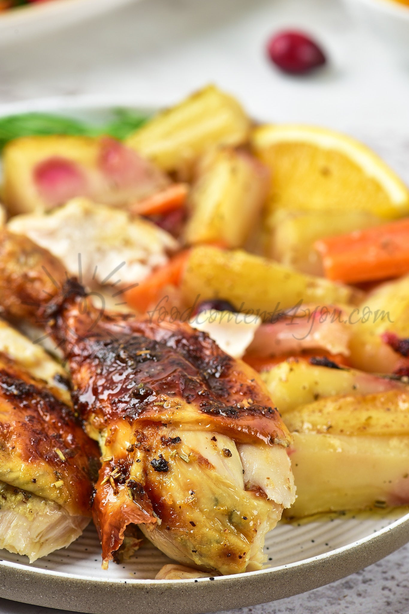 Christmas Roasted Chicken with orange and cranberries