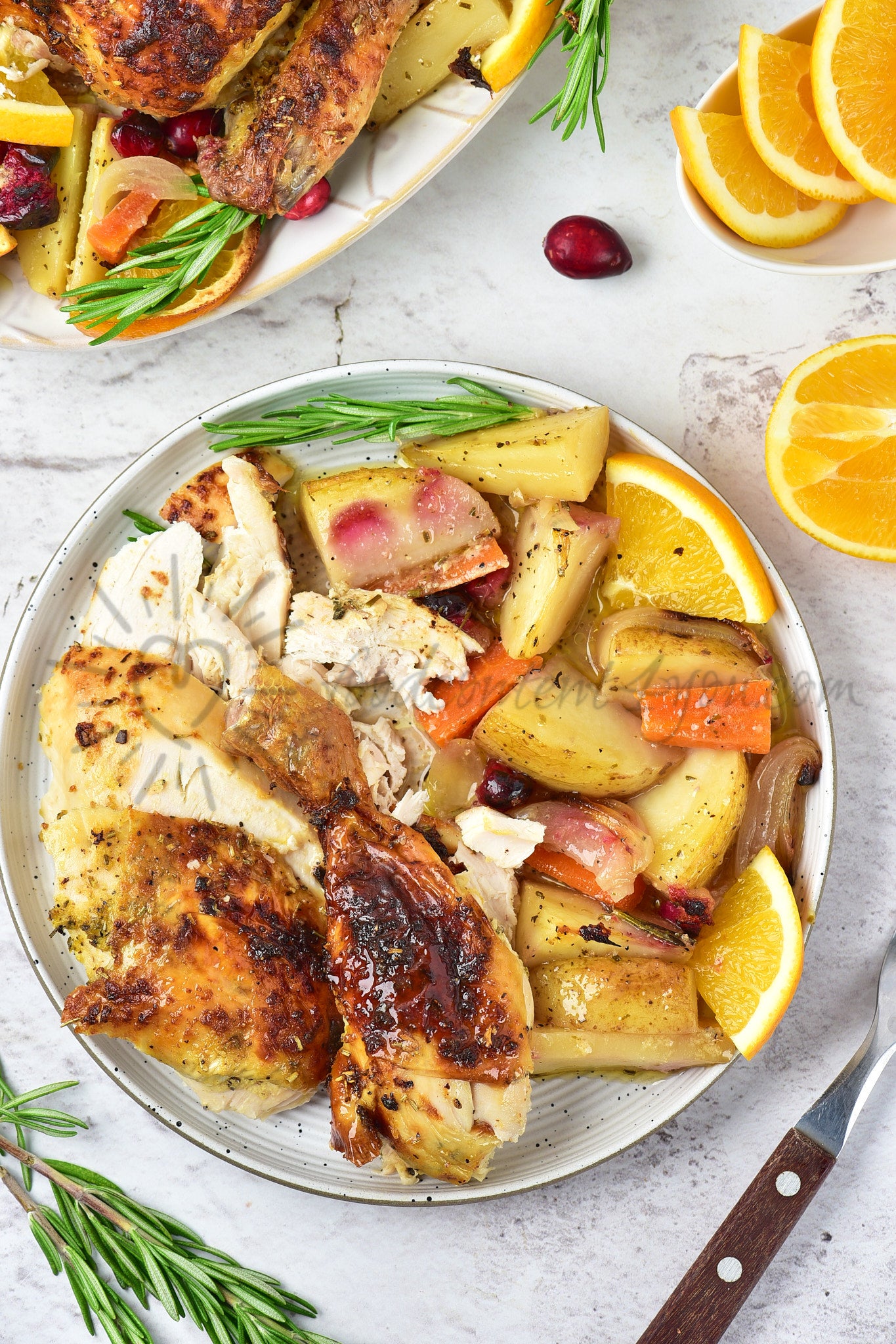 Christmas Roasted Chicken with orange and cranberries